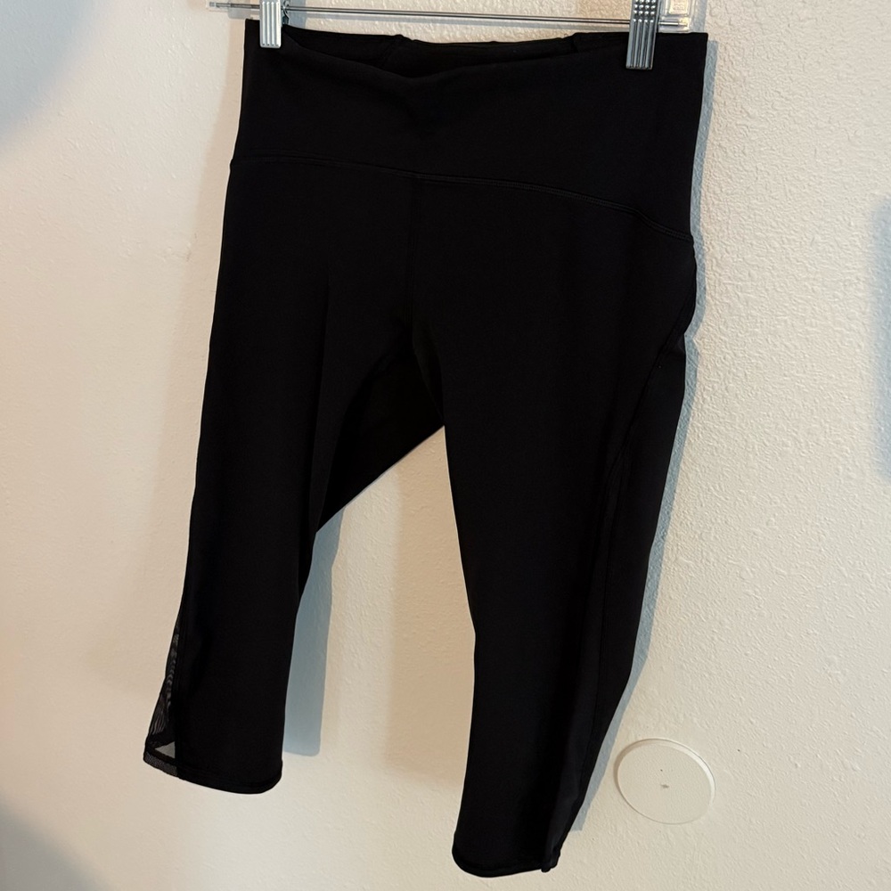 Lululemon Athletica Crop Black Leggings side mesh (high times)